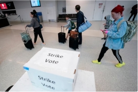 Some airport workers go on strike during Thanksgiving travel